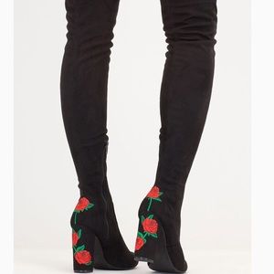High knee black rose boots